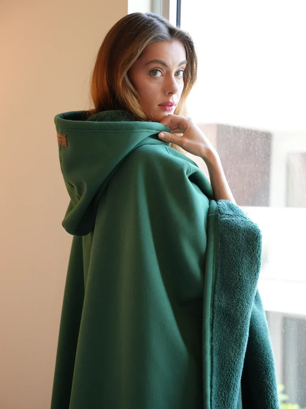 Oversized hooded fleece blanket in mint, front view