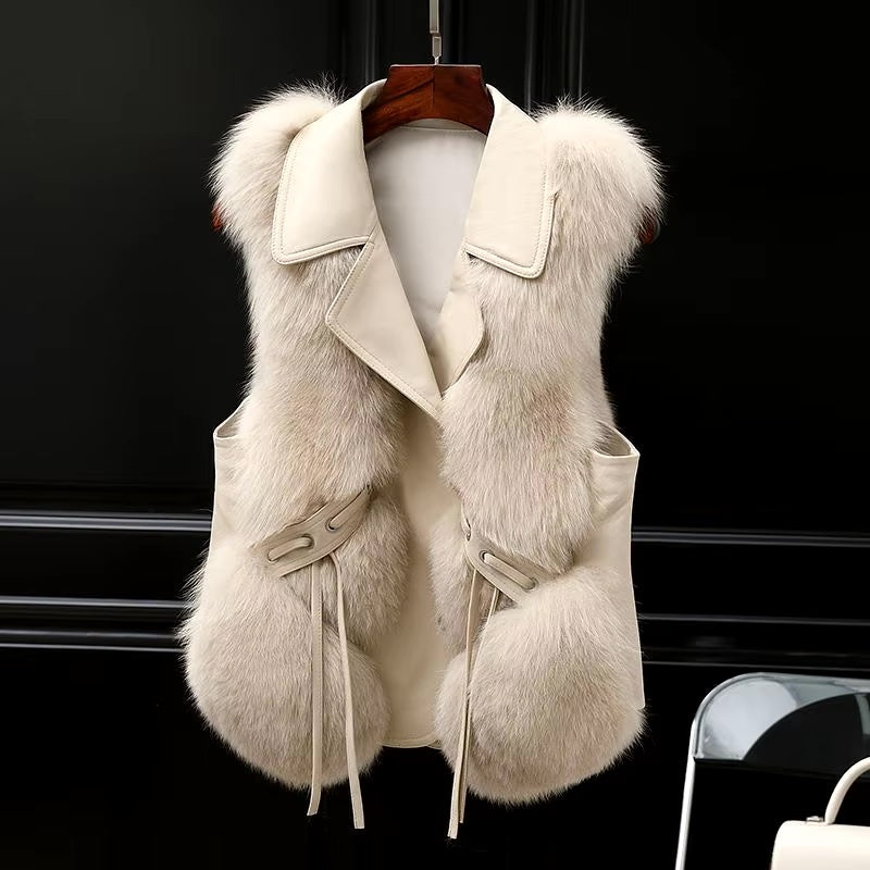 Faux fur gilet with waist ties in ivory cream, front view