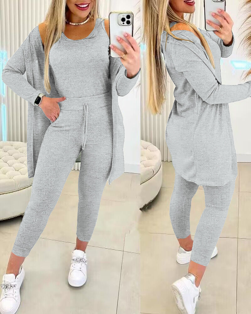 Three piece lounge set with tank, coat and trousers in green, front view
