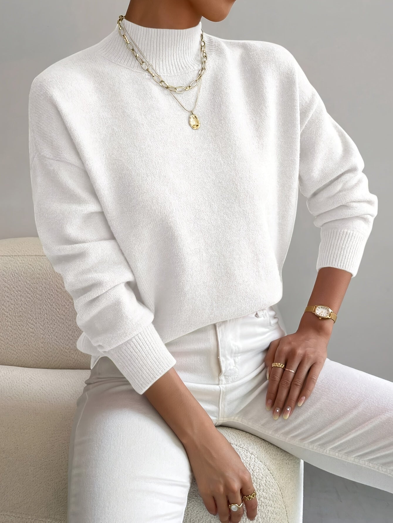 Soft knit high collar jumper in white, front view