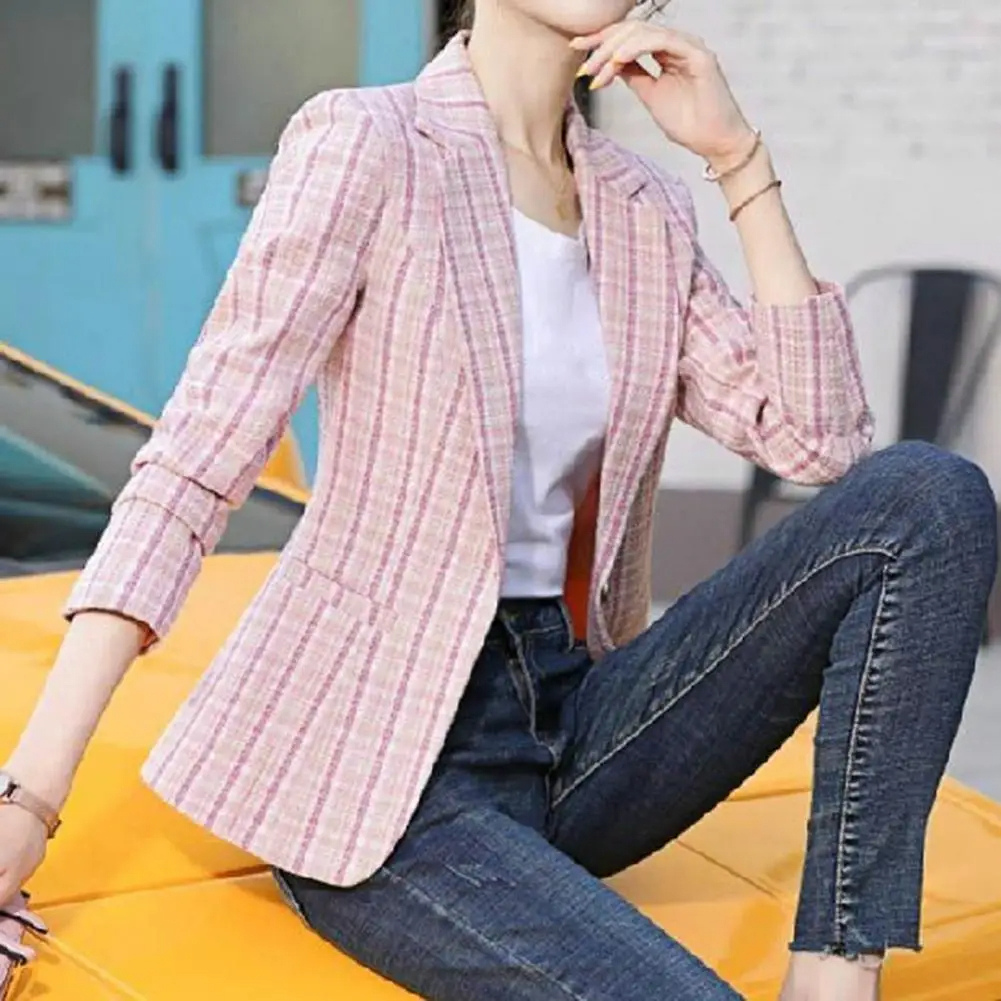 Tailored single-button blazer in beige, shown with a structured office fit