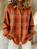 Checked knit crew neck jumper in orange, front view