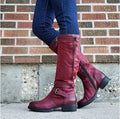 Round toe knee-high boots in black, side view