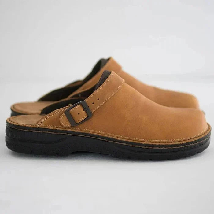 Backless slip on shoes with thick sole in brown, side view