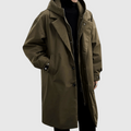 Waterproof hooded raincoat in green, front view