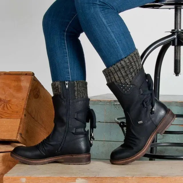 Mid calf boots with rhinestone detail in black, side view