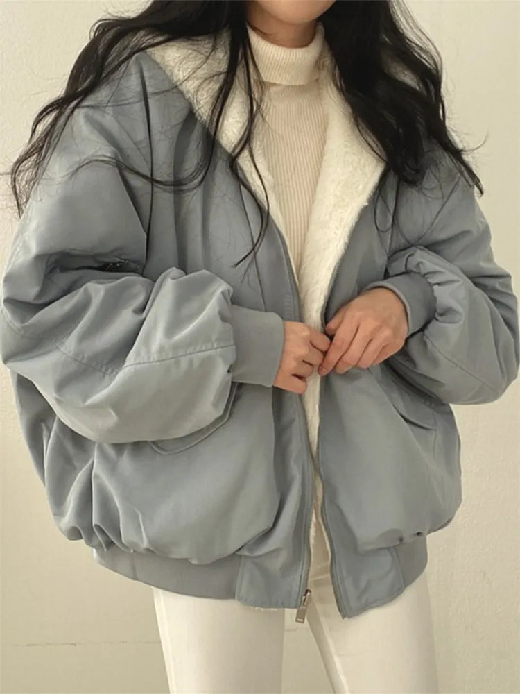 Reversible shearling lined winter jacket in beige, front view