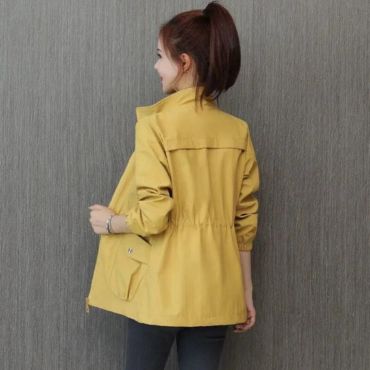 Waterproof lightweight trench coat with belt, shown in a mid-length silhouette