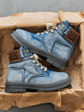 Washed denim boots with chunky sole in blue, side view