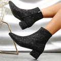 Glitter ankle boots in black with block heel, side view
