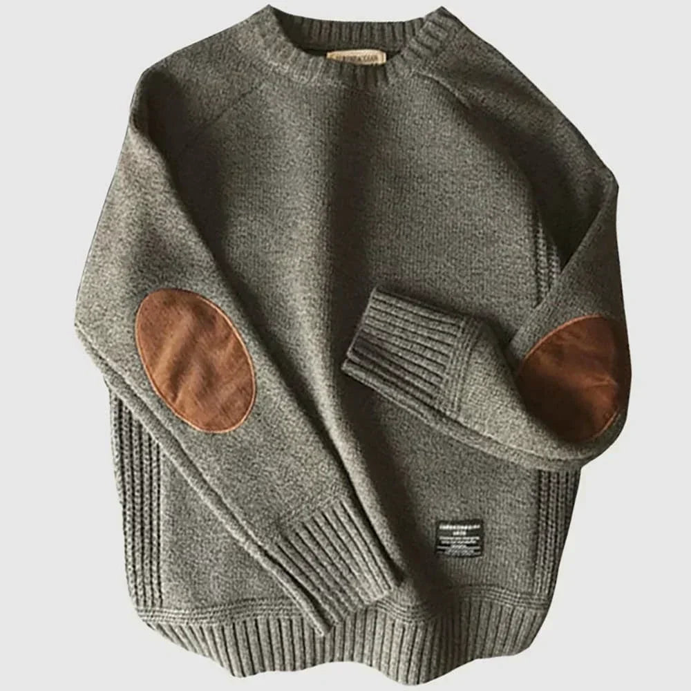 Crew-neck knit sweater with elbow patches in red, front view