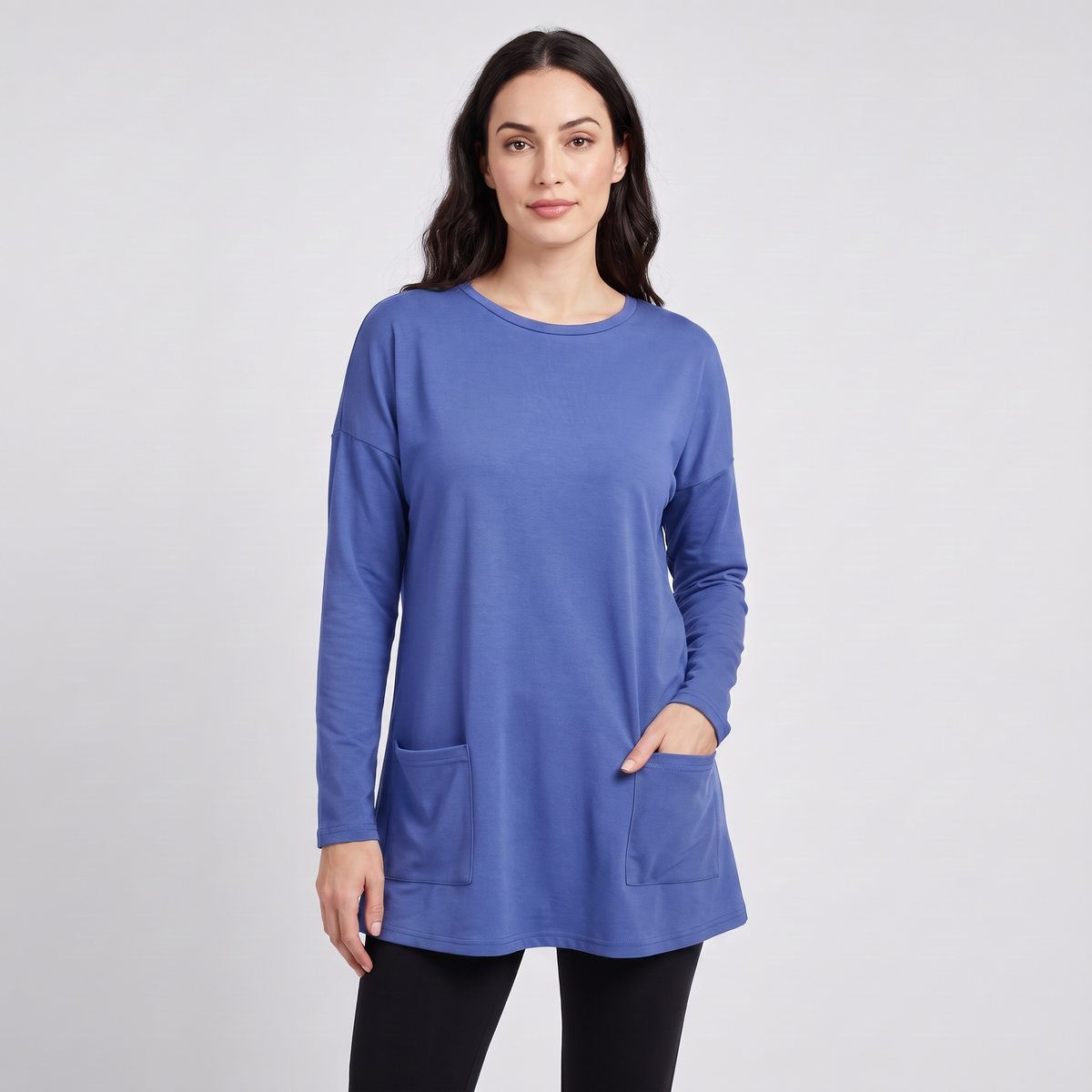 Oversized tunic sweater with pockets in blue, front view