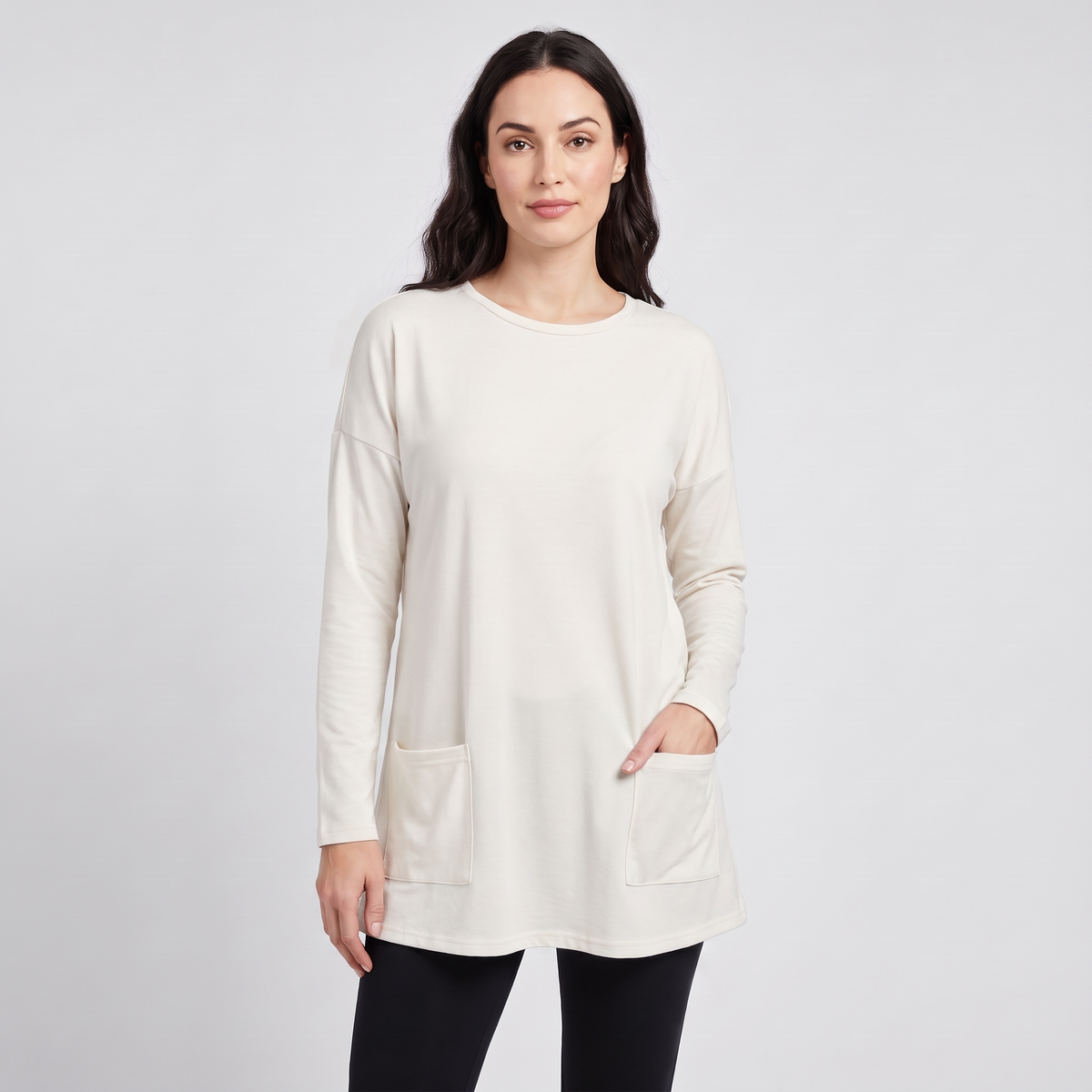 Oversized tunic sweater with pockets in white, front view