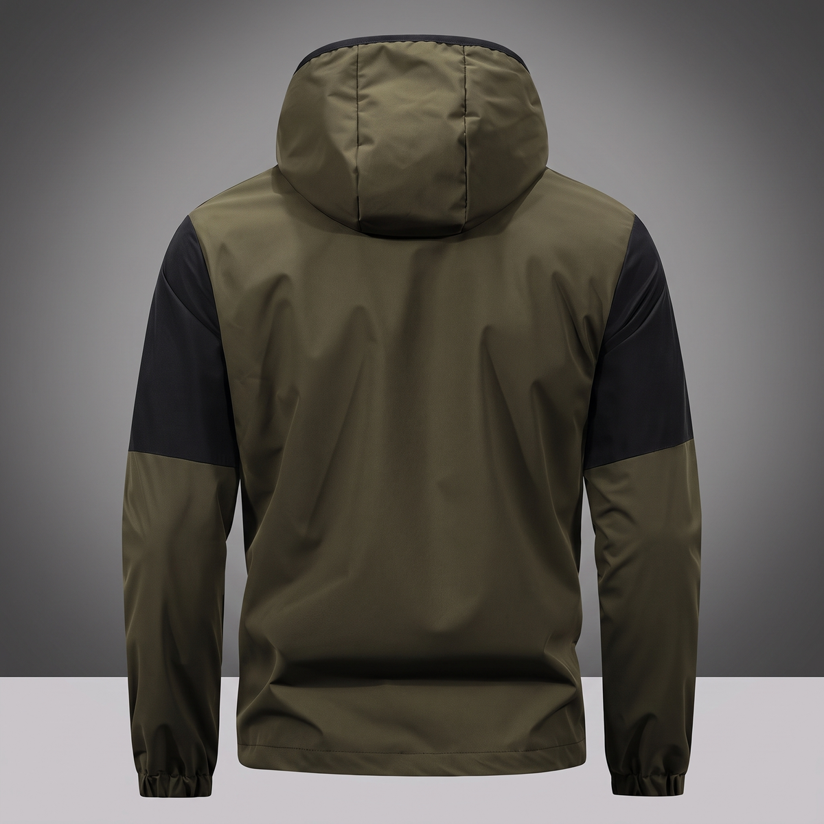 Waterproof hooded rain jacket in army green, back view