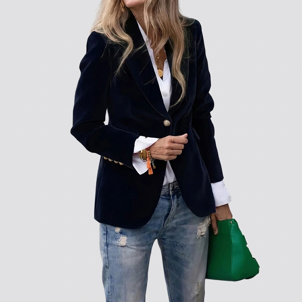 Velvet blazer with gold buttons in black, studio photo