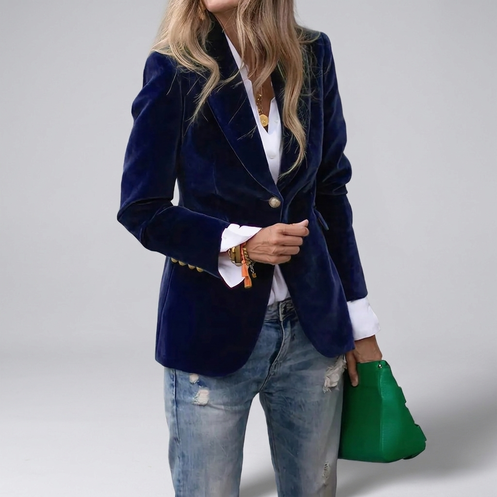 Velvet blazer with gold buttons in blue, studio photo
