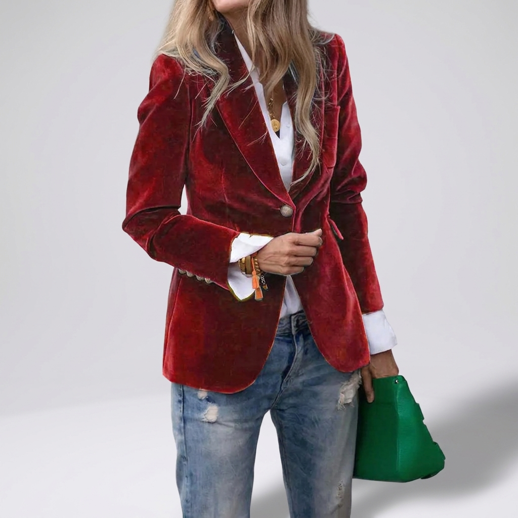 Velvet blazer with gold buttons in red, studio photo