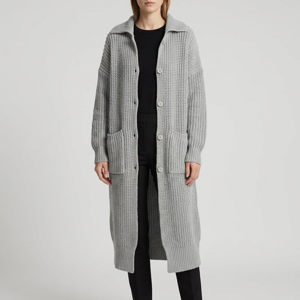 Chunky knit longline cardigan in grey, worn open, studio photo