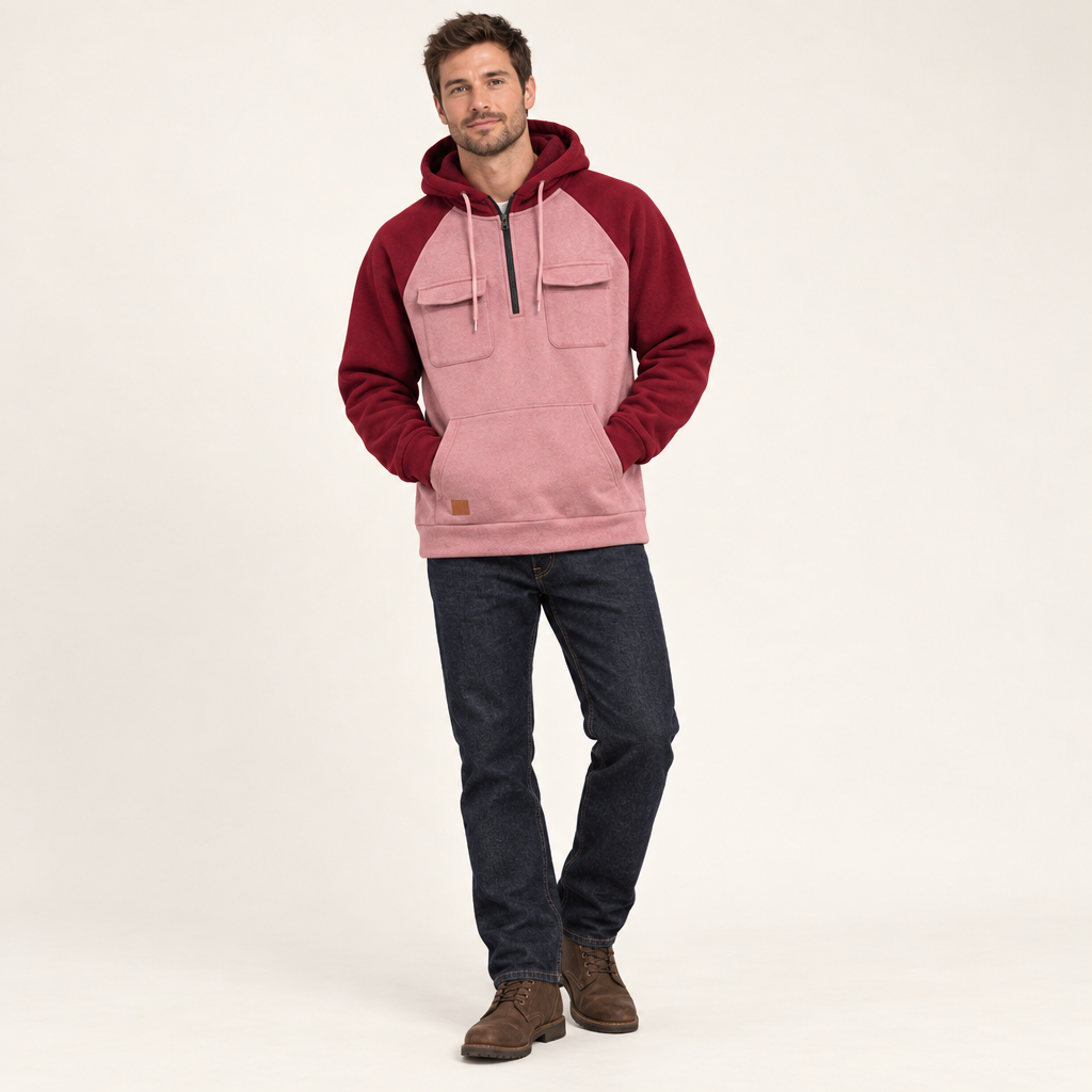 Colour block quarter zip hoodie in pink with burgundy sleeves and hood, worn with jeans