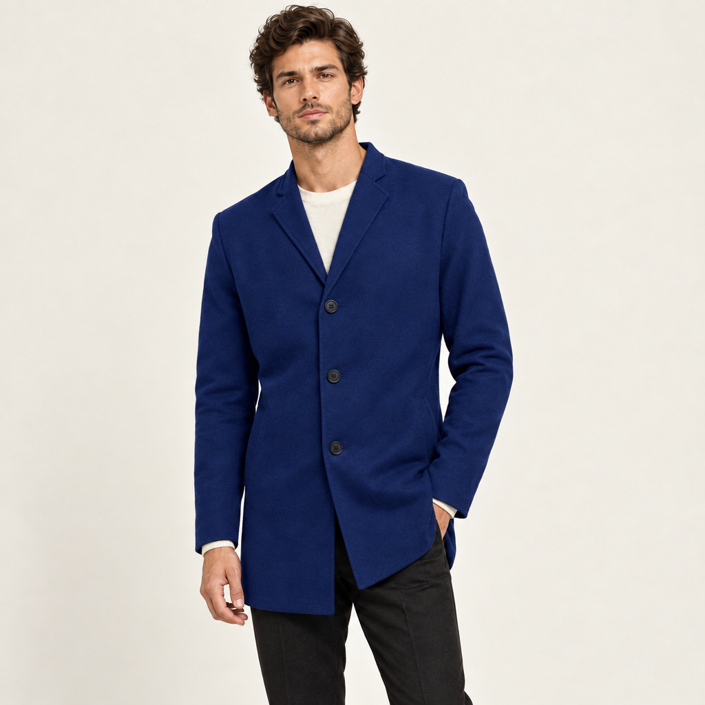 Blue collarless wool-blend jacket with a tailored slim fit, worn by a model