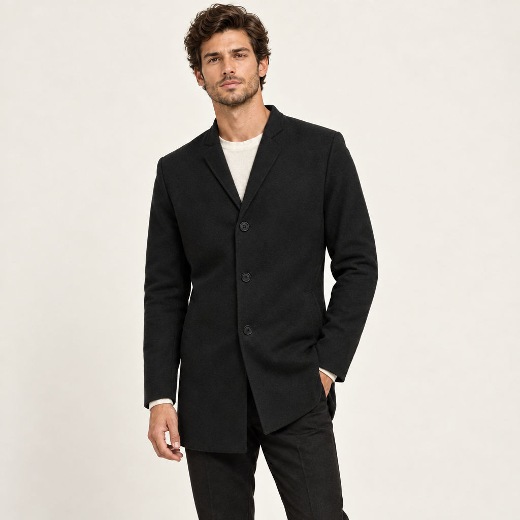 Black collarless wool-blend jacket with a tailored slim fit, worn by a model