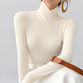 Fleece lined stretch turtleneck top in ivory, smooth knit, studio photo