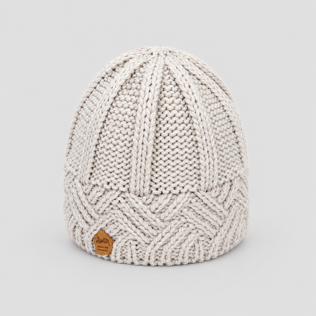 Chunky knit beanie hat in beige, studio photo