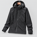 Waterproof breathable windbreaker jacket in black, light grey studio photo
