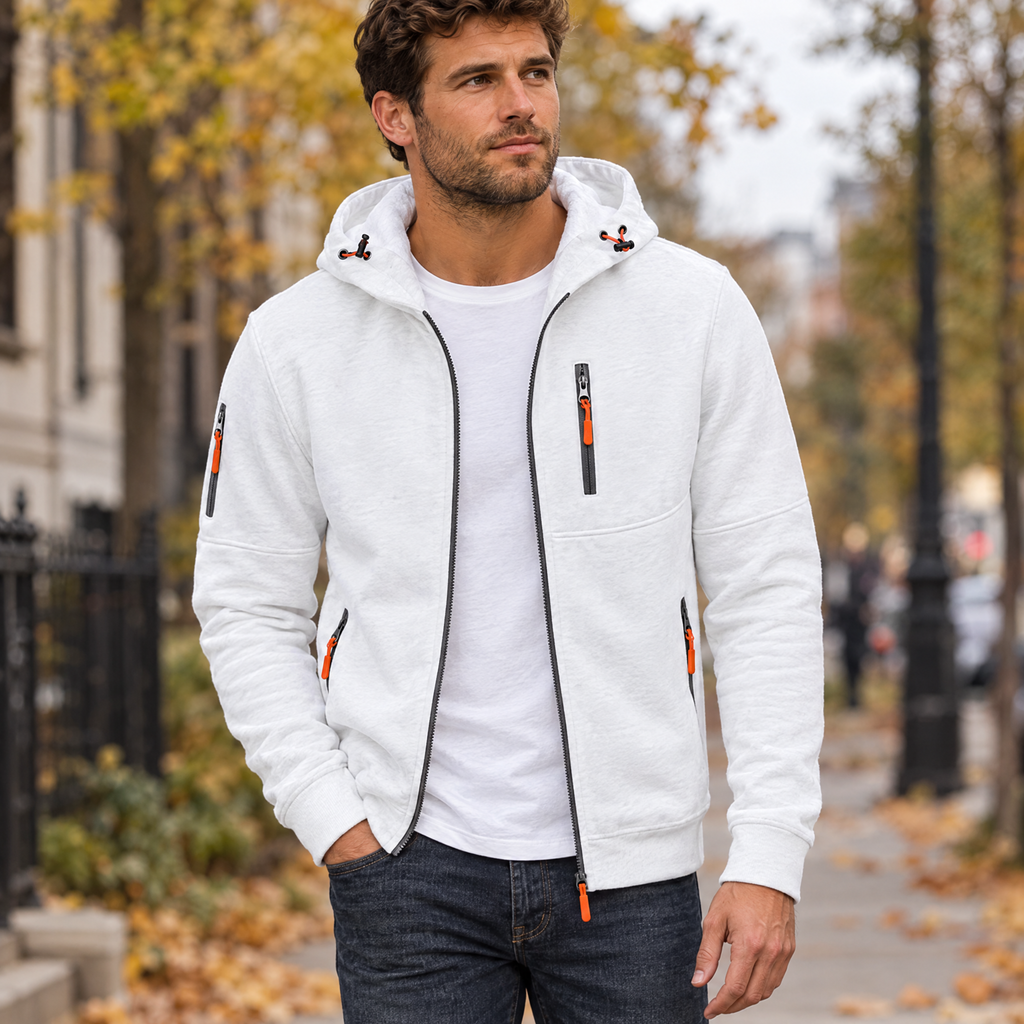 Full zip hoodie in white worn with jeans on a city street