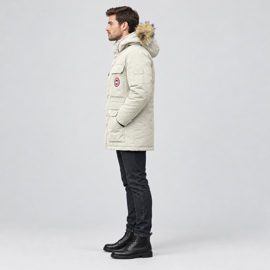 Model wearing the white down filled parka jacket, side view showing the mid length fit