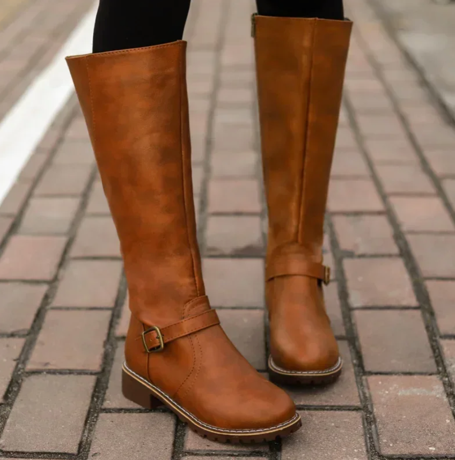 Boots with removable footbed in black, side view